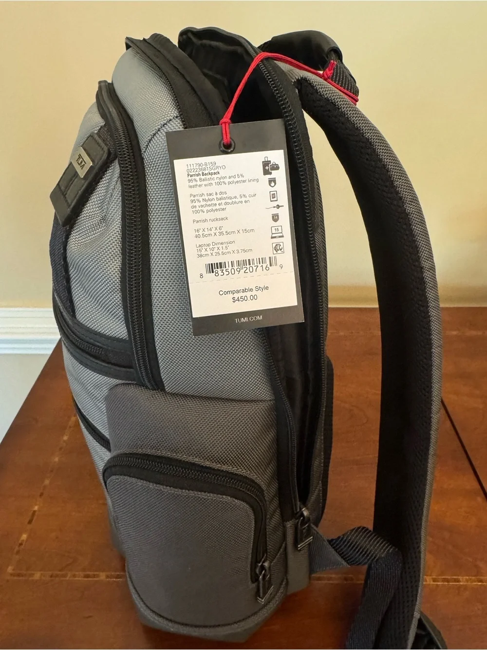 Tumi Gray Parrish Backpack with Black Trim and Tan Leather Tag